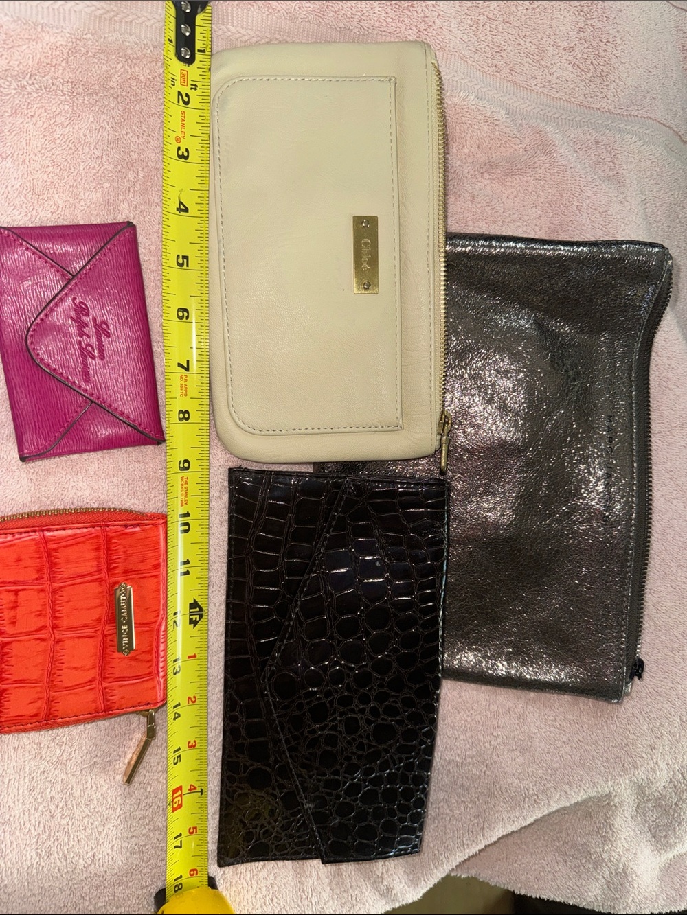 Marc Jacobs cream leather zip-around wallet with gold logo plate